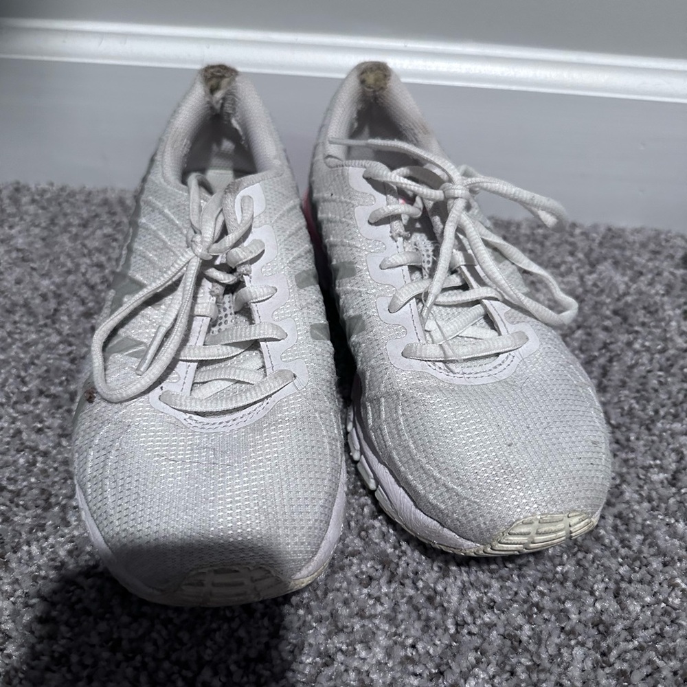ASICS women’s shoe. Worn